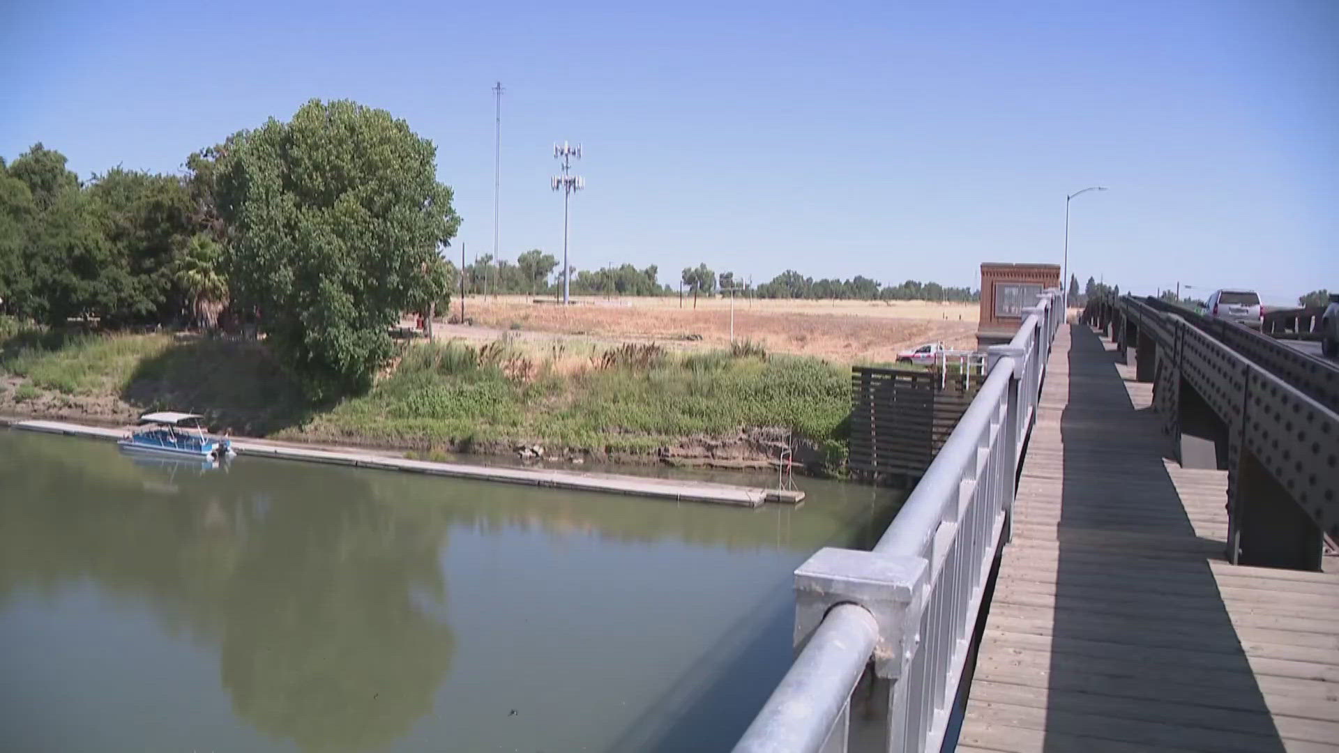 A search and recovery operation is underway after two men jumped from the Knights Landing Bridge Tuesday night, with one failing to resurface.