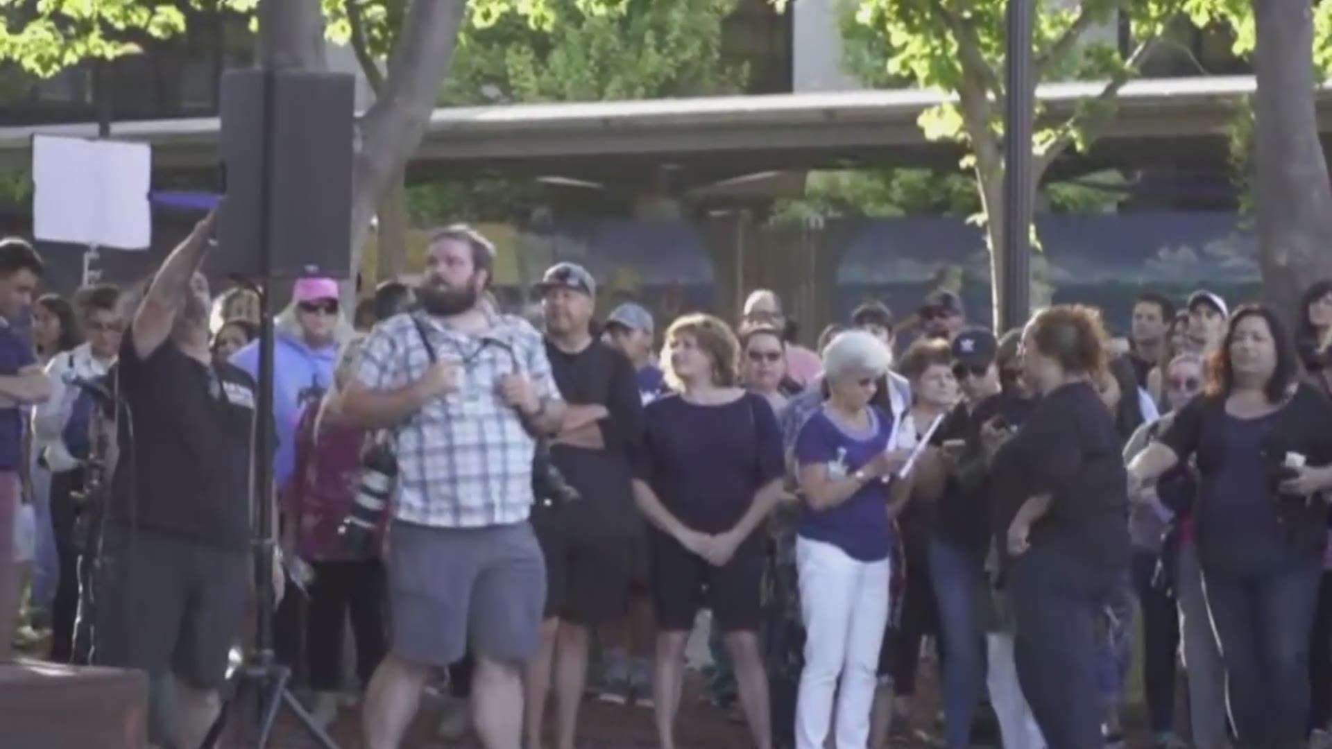 Gilroy community members and residents from around Northern California come together to mourn the loss of the three people killed in the Gilroy Garlic Festival shooting.