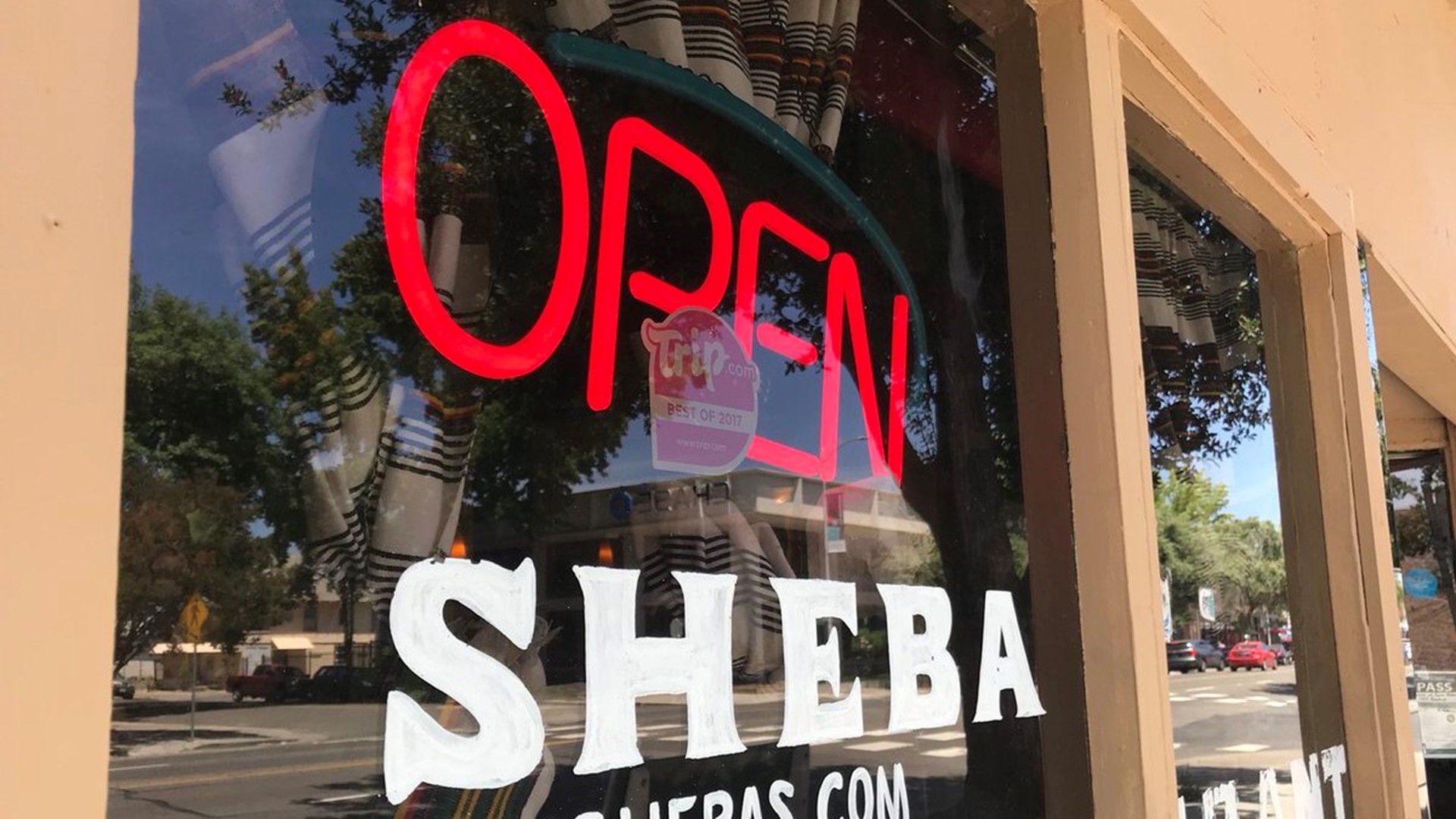 One week after someone was caught on camera lighting Sacramento's Queen Sheba restaurant on fire and running away, they've reopened to the community.