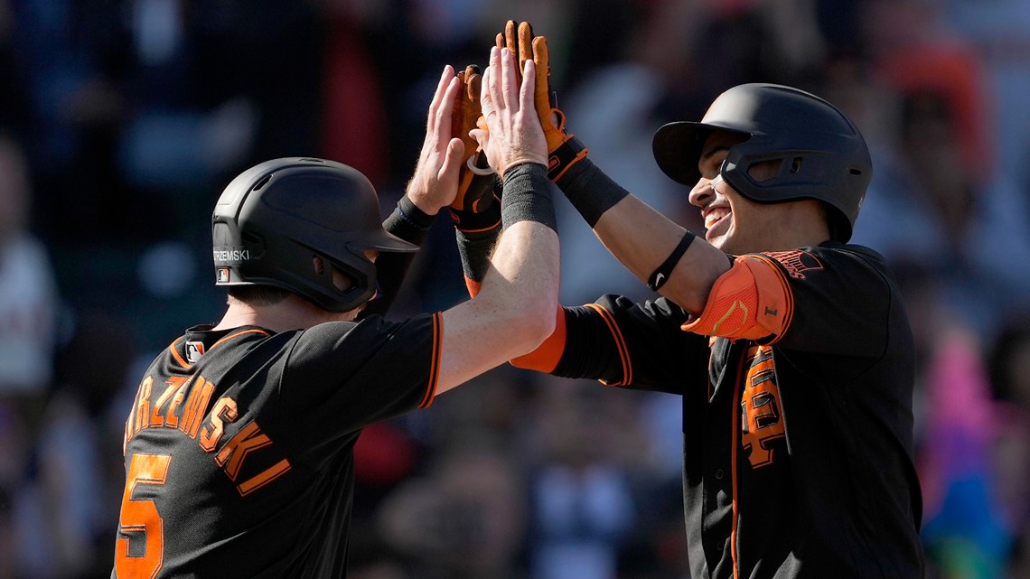 Wilmer Flores has grand slam, 6 RBIs as Giants thump Cardinals 13-7