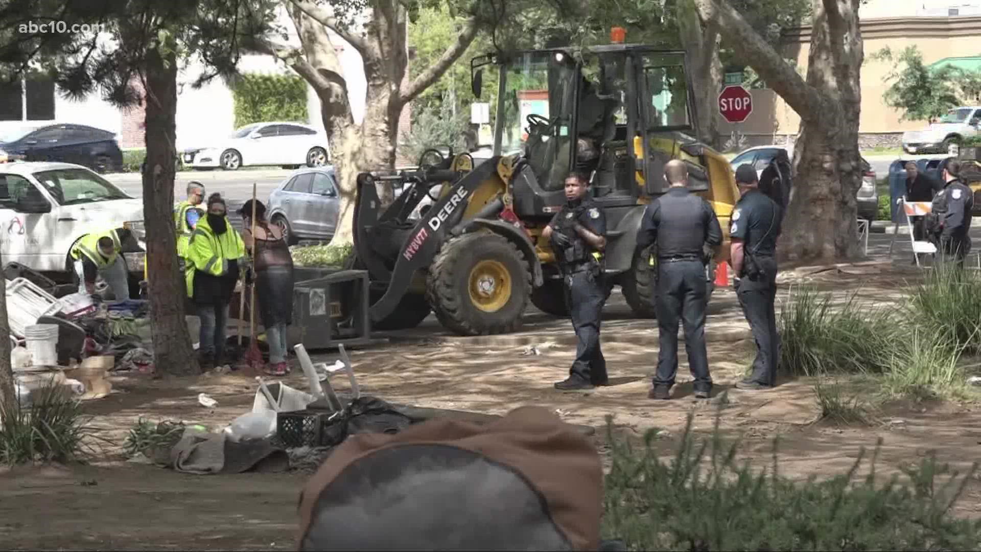 The city of Sacramento said they had to clear the encampment to honor a lease agreement with a local group. The city did not say who that group was.