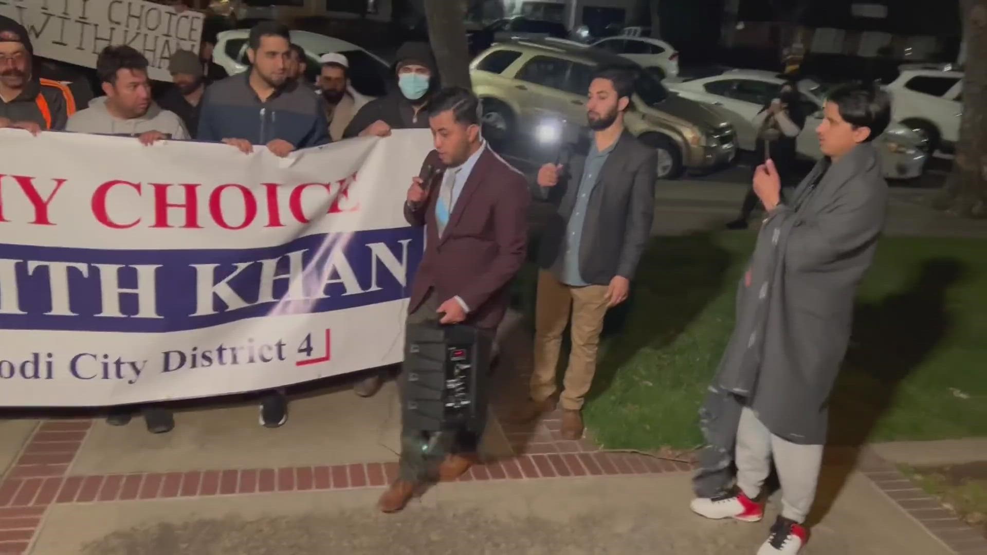 Shakir Khan took his protest to a Lodi City Council meeting as he faces election crime charges.