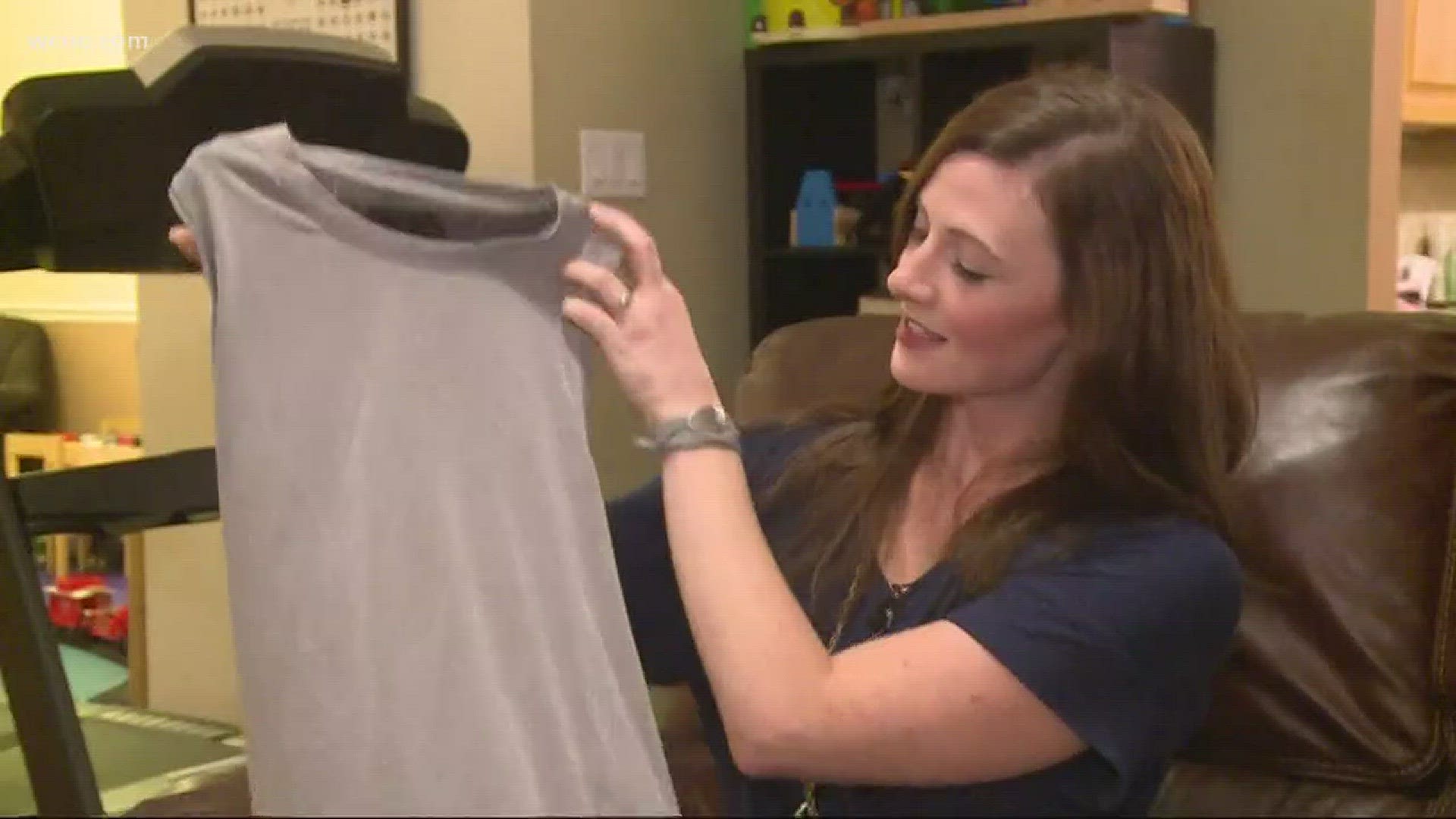 A Charlotte-area woman says she was kicked out of her gym for wearing a tank top.