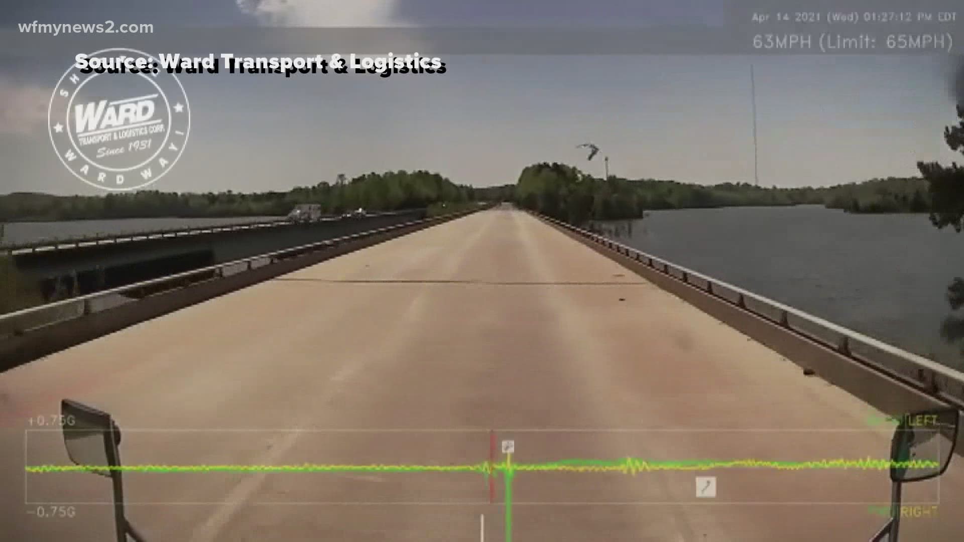 The driver, Barry Poff, was surprised when a bird flew over the bridge crossing Randleman Lake, dropping his seafood dinner onto the truck's windshield.