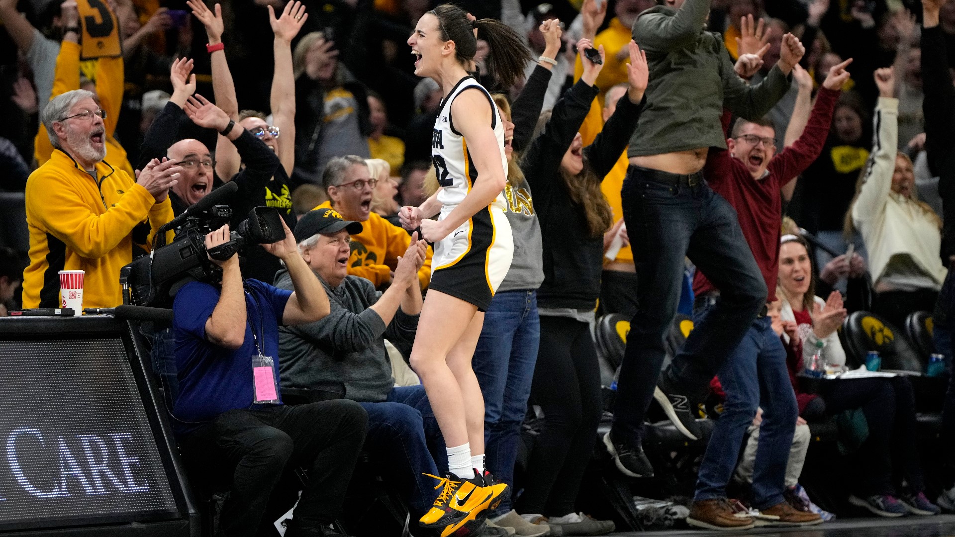 Caitlin Clark made a 3-pointer to pass Kelsey Plum as the NCAA's all-time women's basketball scorer.