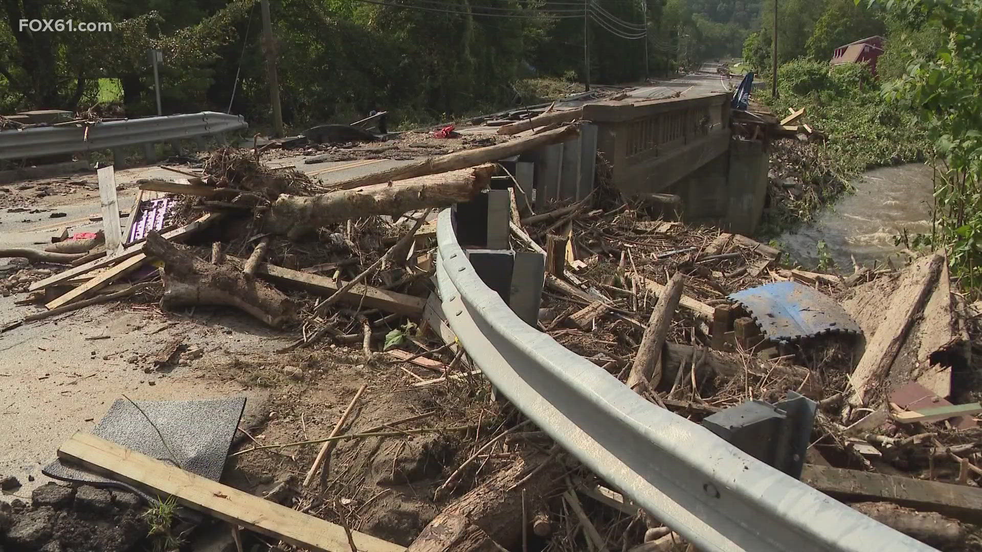 Naugatuck Valley neighbors combed over the devastation left behind by Sunday's storm as the cleanup, especially along Route 67 in Oxford, continues.