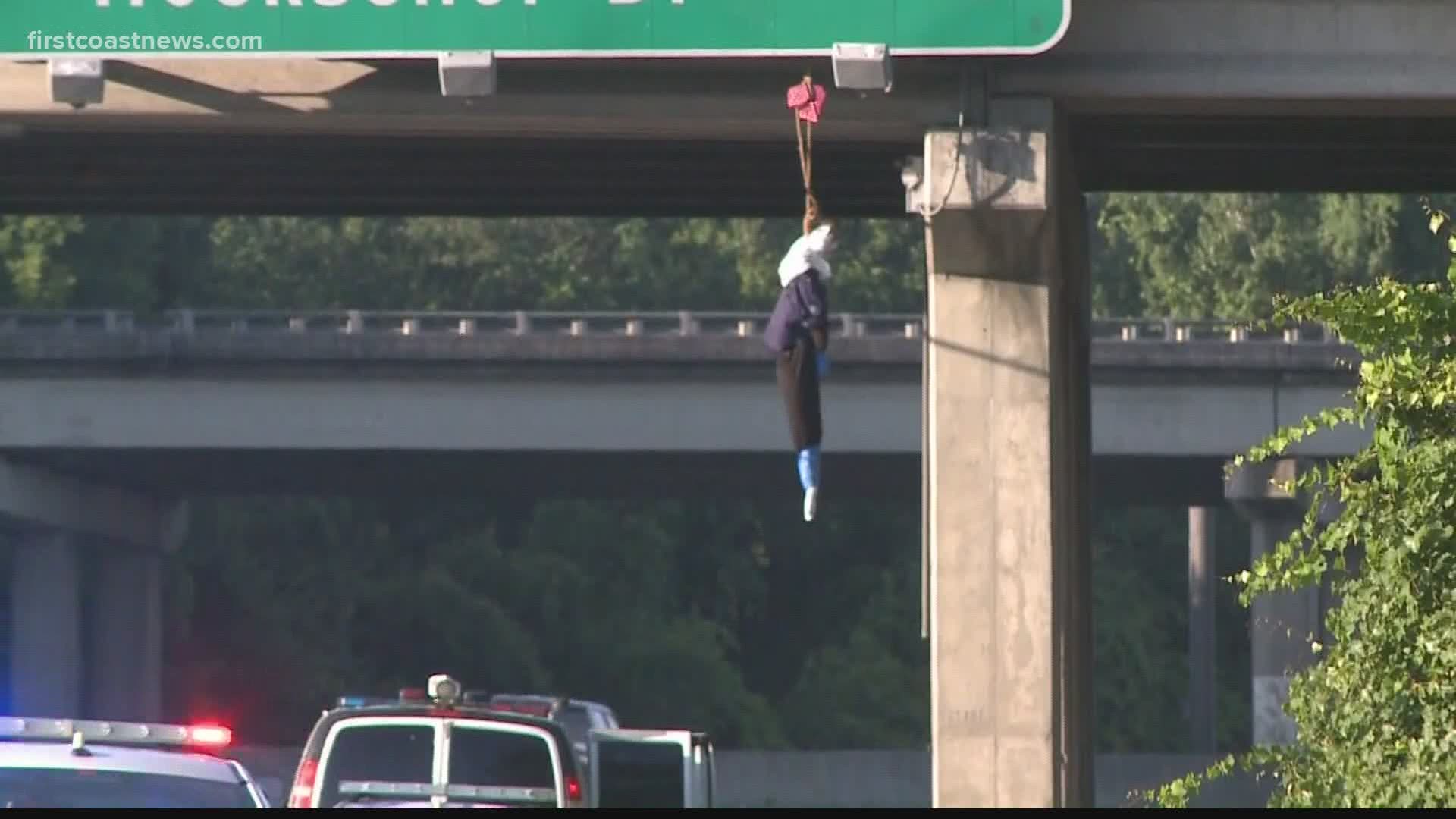 The Jacksonville Sheriff's Office is investigating Saturday after a mannequin was found hanging from the Interstate-95 overpass near the Zoo Parkway exit.