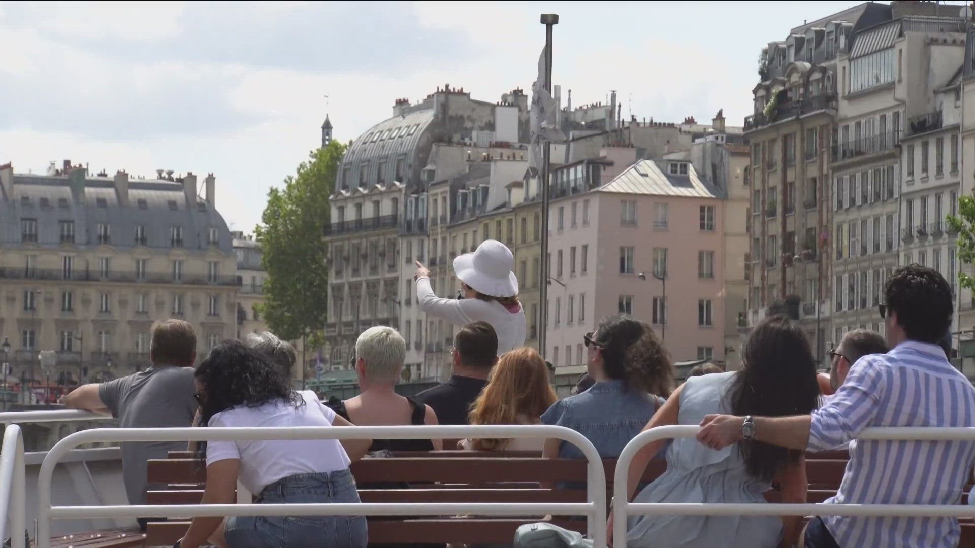 Lasers off the Eiffel Tower, Olympians on boats and hundreds of people watching along the river.